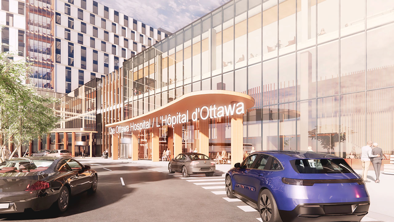 Concept artistique de l’entrée principale de l’édifice principal du nouveau campus de L’Hôpital d’Ottawa. En avant-plan, des voitures sont stationnées au rond-point, alors que des personnes entrent dans l’édifice et en sortent. Un panneau au-dessus de l’entrée : The Ottawa Hospital / L’Hôpital d’Ottawa.